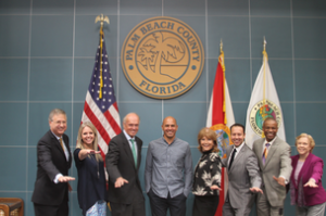 commissioners with kelly slater